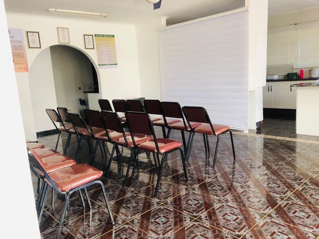 Quiet waiting chairs and Patients’ Rights Charter display at Elshaddai Health Care Centre